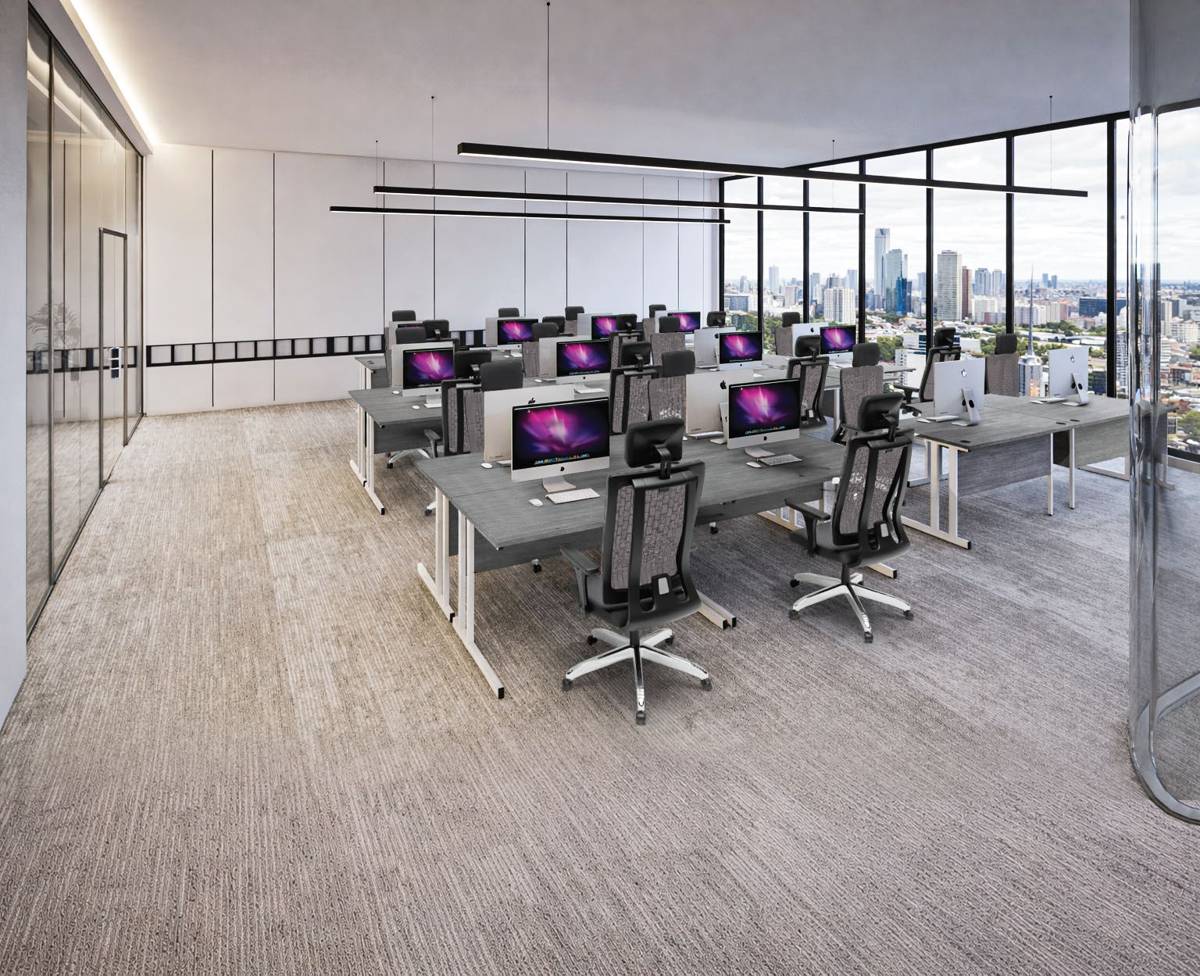 A row of Fontana desks in a glass-walled open-plan office